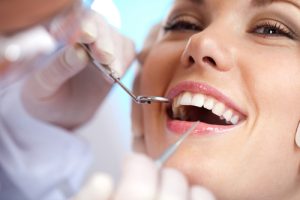 woman getting a dental exam