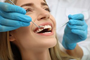 woman getting a dental treatment
