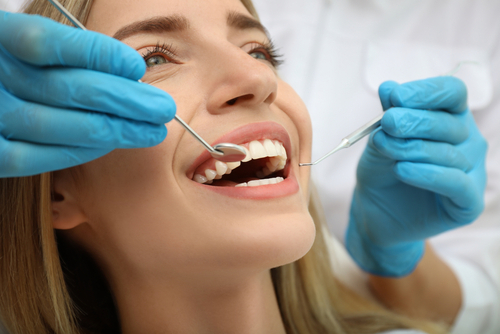 woman getting a dental treatment