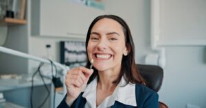 Happy,Woman,,Portrait,Or,Patient,In,Dental,Clinic,For,Crown,